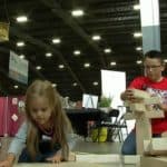 Students play with balsa blocks at the Tulsa State Fair