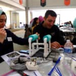 Teachers assemble SeaPerch robots