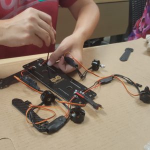 Teacher works on drone